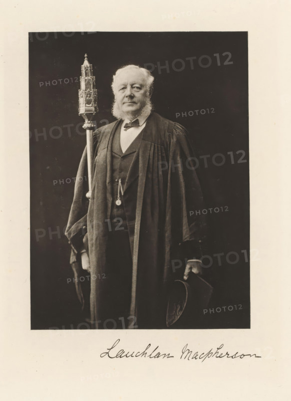 Portrait of Lauchlan Macpherson, page, photomechanical print, cliché maker: T. & R. Annan & Sons, Glasgow, c. 1886 - in or before 1891, photographer, paper, photoaquatint, height 193 mm x width 142 mm, Person, Lauchlan Macpherson, historical persons, A sepia-toned portrait of an older man standing against a dark background, wearing a long dark robe over a suit and bow tie, with prominent sideburns and a neutral facial expression; he holds an ornate ceremonial staff with a decorative top in one hand and a hat in the other, and a pocket watch chain is visible on his vest.