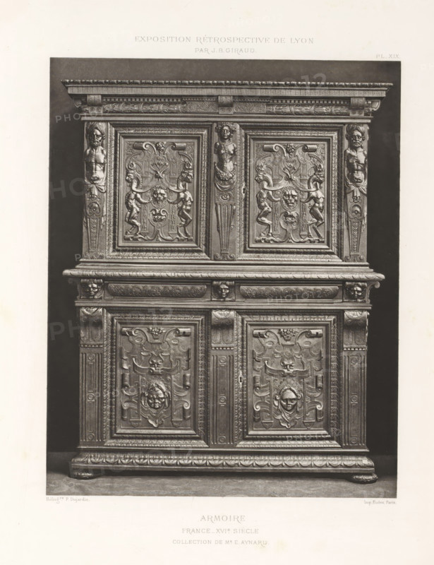 16th-century French wooden cabinet, at the Exposition Rétrospective of 1877 in Lyon, France, photomechanical print, This print is part of a cover with 79 prints on 54 sheets and 65 text sheets., inscription: 'ARMOIRE, FRANCE_XVIe SIÈCLE, COLLECTION DE Mr E. AYNARD.', number: 'PL. XIX.', inscription: 'EXPOSITION RÉTROSPECTIVE DE LYON, PAR JB GIRAUD.', photographer: Jacques Garcin, Lyon, clichémaker: Dujardin, printer (person): Imprimerie Eudes, Paris, 1877 - 1878, printer (person), paper, photoaquatint, height 463 mm x width 313 mm, ornamental cupboard (wood and other phytogenic material), A tall wooden cabinet with ornate carved panels fills the image, showing the upper and middle sections against a dark background; the top has a molded cornice with carved decorative bands and a central column featuring a carved female bust, flanked by two recessed square panels each with symmetrical reliefs of stylized foliage, playful putti, and a central grotesque mask, while the side pilasters disp...