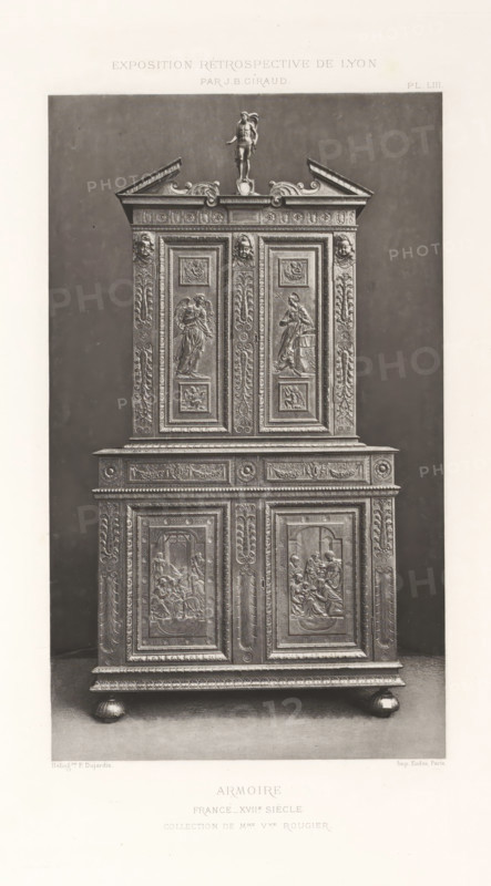 17th-century French wooden cabinet, at the Exposition Rétrospective of 1877 in Lyon, France, photomechanical print, This print is part of a cover with 79 prints on 54 sheets and 65 text sheets., number: 'PL. LIII.', inscription: 'EXPOSITION RÉTROSPECTIVE DE LYON, PAR JB GIRAUD.', inscription: 'ARMOIRE, FRANCE_XVIIe SIÈCLE, COLLECTION DE Mme Vve ROUGIER.', photographer: Jacques Garcin, Lyon, cliché maker: Dujardin, printer (person): Imprimerie Eudes, Paris, 1877 - 1878, printer (person), paper, photoaquatint, height 463 mm x width 313 mm, ornamental cupboard (wood and other phytogenic material), A tall ornate wooden cabinet with decorative panels and carved reliefs stands on rounded bun feet against a plain dark backdrop; the upper section has a pediment with scrollwork and a small sculpture of a standing figure atop the center, flanked by carved faces and pilasters with floral and foliate motifs, while the doors and panels display framed bas-relief scenes of draped figures and ornament...