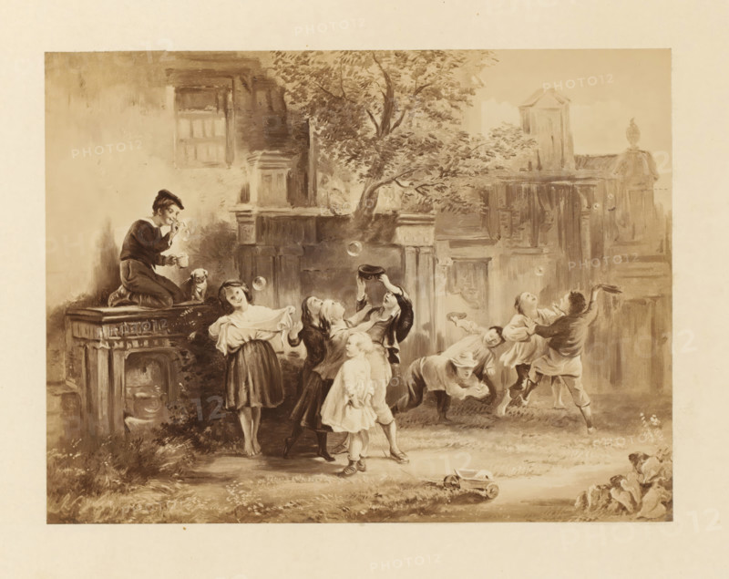 Photo reproduction of a sketch of Blowing Bubbles. The Past and the Present by Sir George Harvey, photograph, reproduction, page, photographer: Thomas Annan, after design by George Harvey (Sir), c. 1865 - in or before c. 1870, paper, albumen print, height 159 mm x width 212 mm, bubble-blowing (children's games and plays), A sepia-toned illustration shows a group of children gathered in an outdoor courtyard with architectural ruins and a tree in the background. A boy kneels on a stone ledge blowing bubbles from a pipe while a small dog sits beside him. Several children stand nearby watching and reaching for the floating bubbles, one girl holding a cloth and smiling, another child holding a hat up toward a bubble. Other children are shown in playful poses, one bending forward and another leaning back with arms outstretched. Stone columns, carved masonry, and a weathered wall frame the scene, and a toy cart lies on the grass in the foreground.