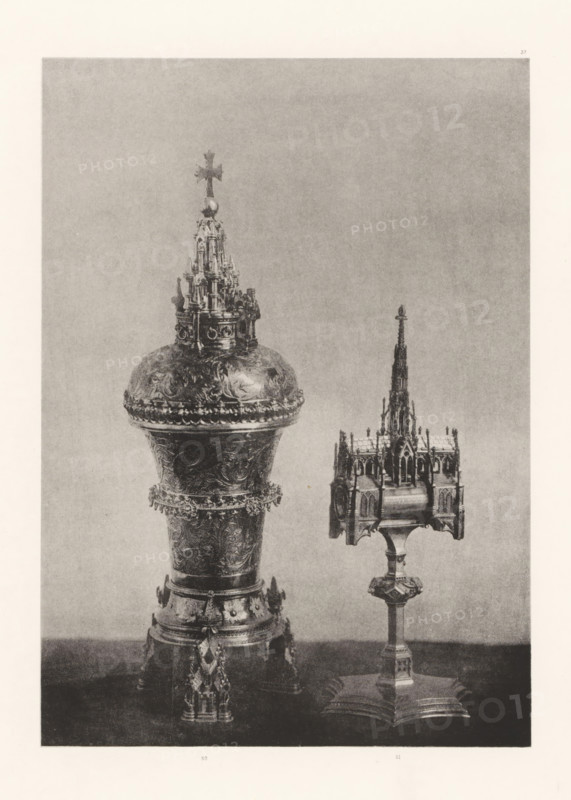 Gilded silver vase and a monstrance, displayed at an exhibition on religious objects from the Middle Ages and Renaissance in 1864 in Mechelen, page, photomechanical print, number: '-37', number: '50 . 51', number: '50 - 51', photographer: Joseph Maes, Mechelen, cliché maker: Simonau & Toovey, Antwerp, 1864 - in or before 1866, paper, photolithography, height 242 mm x width 172 mm, vessels and utensils used in the church, relics (and reliquaries), Period, 1864, A photograph of two ornate metal objects on stands against a plain backdrop, the object on the left is larger with a rounded top topped by a miniature architectural crown and a cross, its surface covered in engraved decorative motifs and beaded borders, the body narrowing into a flared base with chains and pendants hanging from a lower band, while the object on the right is smaller with a rectangular, cathedral-like structure featuring pointed spires and arched details mounted on a slender column and a multi-sided base.