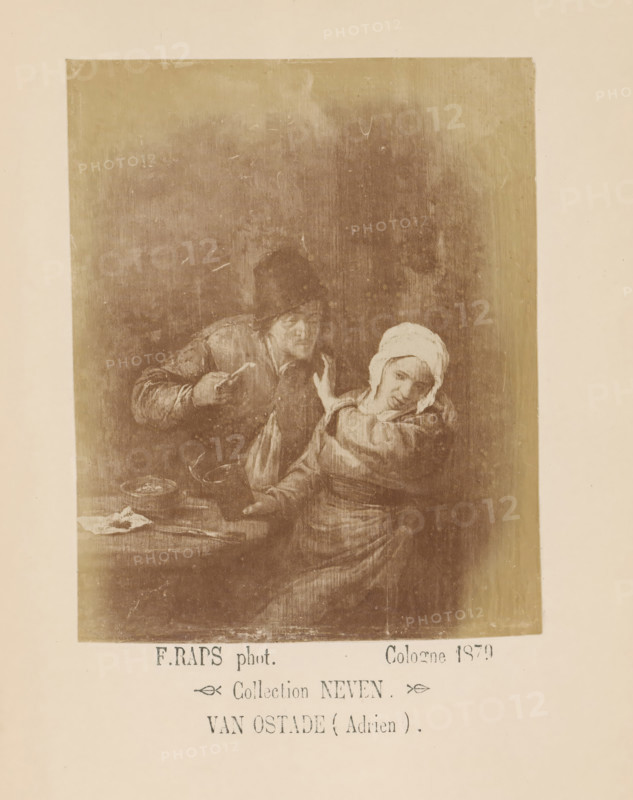 Photo reproduction of a painting of a peasant harassing a woman by Adriaen van Ostade, photograph, reproduction, page, inscription: 'Collection NEVEN, Van Ostade (Adrien)', photographer: Friedrich Raps, Cologne, after painting by Adriaen van Ostade, 1879, North Rhine-Westphalia, paper, albumen print, height 117 mm x width 93 mm, landscapes (landscape with figures, staffage), A sepia-toned rectangular image set against a pale background shows a dim indoor scene with two figures seated close together at a table; one figure wears a dark hat and leans forward with an arm extended toward the other, and the other figure wears a light-colored head covering and leans back with a turned head and an arm raised near the chest; a shallow bowl and a cloth rest on the table surface in front of them, and the surrounding area within the rectangle is marked by uneven shading and visible scratches or marks on the image surface.