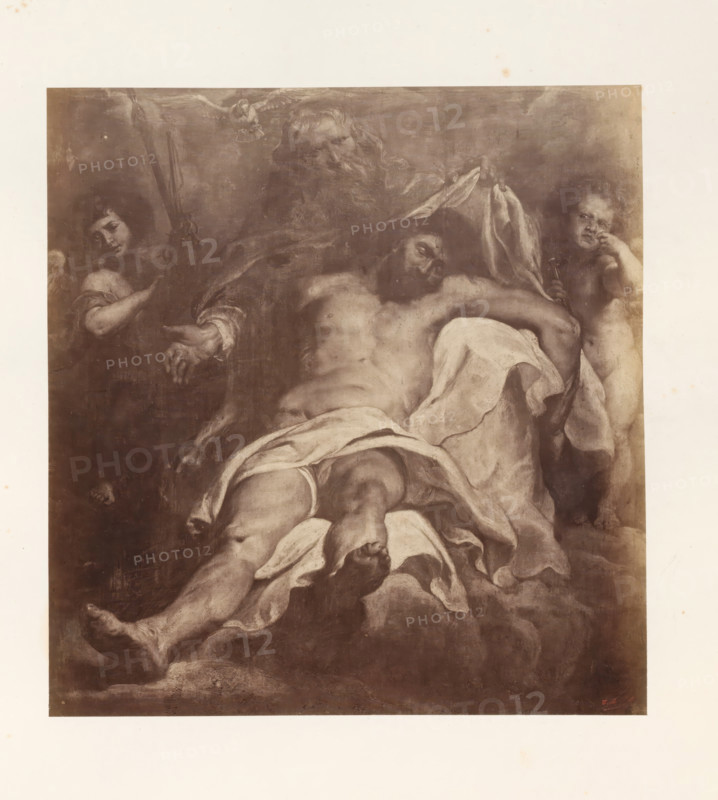Photo reproduction of the Holy Trinity by Peter Paul Rubens, photograph, reproduction, page, photographer: Edmond Fierlants, after painting by Peter Paul Rubens, publisher: C. Muquardt, Brussels, c. 1856 - in or before c. 1861, paper, albumen print, albumendruk, height 318 mm x width 302 mm, God the Father holding the crucified or dead Christ, A large monochrome painting reproduction shows a reclining male figure with draped cloth across his lower body, muscular limbs, and a tilted head; an older bearded male figure leans over him with one hand near the reclining figure and flowing garments around them; a childlike figure stands at one side holding a small object and touching its face; another youthful figure appears at the opposite side partially obscured; soft cloudlike forms fill the background and a bird with outstretched wings is visible near the top.