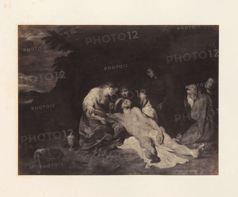 Photo reproduction of the Lamentation of Christ by Peter Paul Rubens, photograph, reproduction, page, photographer: Edmond Fierlants, after painting by Peter Paul Rubens, publisher: C. Muquardt, Brussels, c. 1856 - in or before c. 1861, paper, albumen print, albumendruk, height 257 mm x width 343 mm, Christ's body supported by Mary, others present, A dark rectangular painting bordered by a light background shows a group of figures arranged around a reclining nude male whose body is draped with a light cloth. A woman with light hair leans over him, touching his forehead while another figure nearby supports his head. Two hooded figures stand to the right, one with hands near the face and the other with a sorrowful open mouth. Drapery and textured ground surround the figures, and a vessel and a bucket appear near the lower left. The upper left shows a shadowy landscape with trees and a clouded sky.