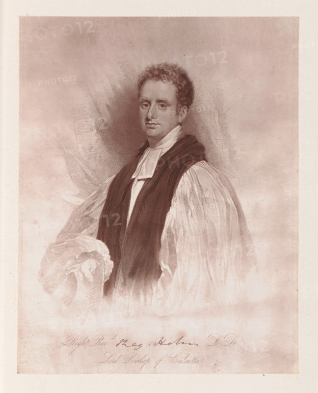 Photo reproduction of a drawing depicting a portrait of Reginald Heber, reproduction, page, photomechanical print, cliché maker: Woodbury Permanent Photographic Printing Company, after drawing by Thomas Phillips, c. 1866 - in or before 1876, photographer, paper, Woodburytype, height 117 mm x width 91 mm, Person, Reginald Heber, historical persons (portraits and scenes from the life) (half-length portrait), A sepia-toned portrait of a man shown from the waist up wearing clerical robes with a dark stole draped over a light, pleated garment; he has short curly hair, a calm facial expression with his gaze directed slightly outward, and one hand extending forward holding a folded cloth or sleeve; the background is softly shaded with subtle textured strokes and the image sits within a pale border.