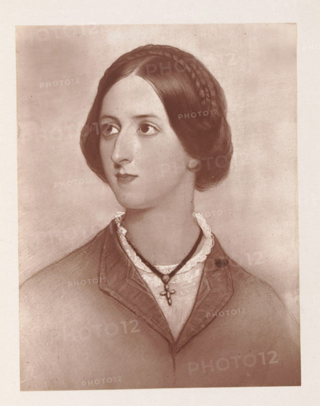Photo reproduction of a drawing depicting a portrait of Anne Louisa Hare, reproduction, page, photomechanical print, cliché maker: Woodbury Permanent Photographic Printing Company, after drawing by Giovanni Battista Canevari, c. 1866 - in or before 1876, photographer, paper, Woodburytype, Woodburytypie, height 118 mm x width 92 mm, Person, Anne Louisa Hare, historical persons - BB - woman, A sepia-toned portrait of a young woman shown from the shoulders up, facing slightly to her left with her gaze directed upward and outward, featuring smooth dark hair styled with a braided band across the top and tucked into a low, rounded bun, a clear oval face with large eyes, a straight nose, and closed lips, wearing a high-collared lace blouse under a tailored jacket and a dark cord necklace with a small pendant in the shape of a cross, all set against a plain, softly textured background.
