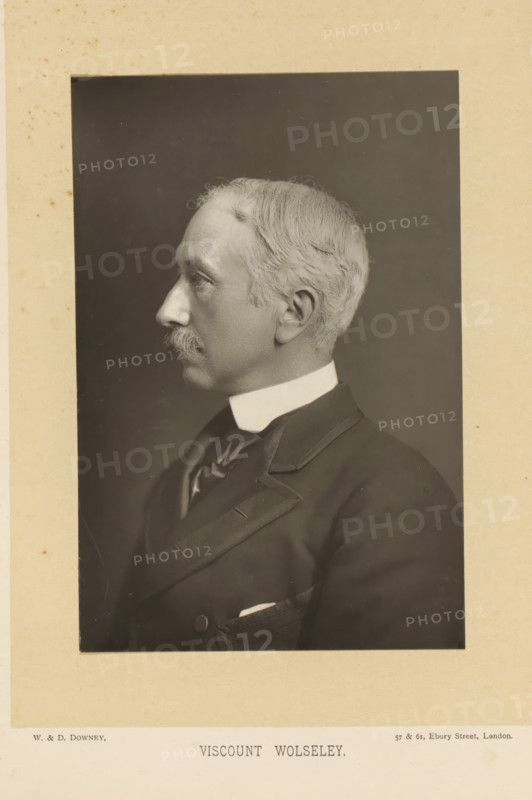 Viscount Wolseley, Portrait of Garnet Wolseley, page, photomechanical print, inscription: '57 & 61, Elbury Street, London.', photographer: Downey, William & Daniel, London, cliché maker: anonymous, c. 1882 - in or before 1892, paper, Woodburytype, height 140 mm x width 93 mm, Person, Garnet Wolseley, officer, A sepia-toned portrait of an older man shown in profile facing left, with light-colored hair combed back and a moustache, wearing a dark formal jacket with a high white collar and a necktie, set against a plain dark background and mounted on a light-colored border.