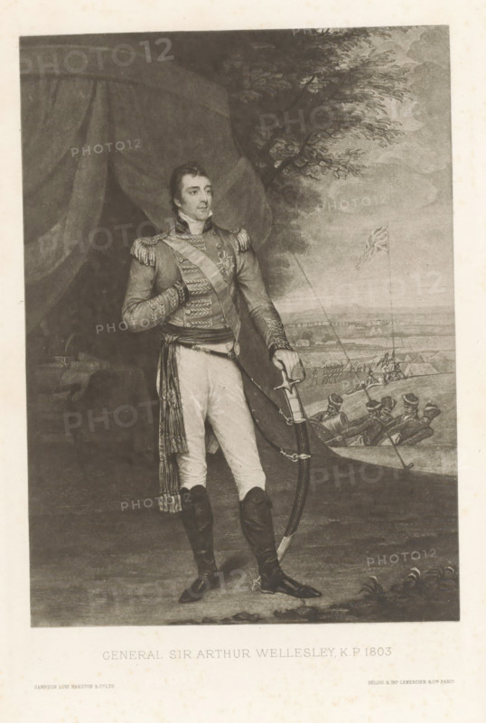 General Sir Arthur Wellesley, KP 1803, reproduction, page, photomechanical print, cliché maker: Lemercier & Cie., Paris, after painting by anonymous, c. 1883 - in or before 1893, photographer, paper, photoaquatint, height 164 mm x width 118 mm, Person, Arthur Wellesley of Wellington, commander-in-chief, general, marshal, A monochrome portrait of a man standing in a military uniform with decorative epaulettes and a sash, one hand tucked into his chest and the other resting on a curved sword hanging at his side; he wears fitted trousers and tall boots with spurs and a long tasseled sash draped from his waist, and his gaze is turned slightly away from the viewer. Behind him a large draped curtain fills the left side while the right side opens to an outdoor scene showing a tree with detailed foliage and a distant encampment with tents and groups of soldiers, a flag flying on a pole, and a low horizon under a cloudy sky. The image has a pale border surrounding the rendered scene.