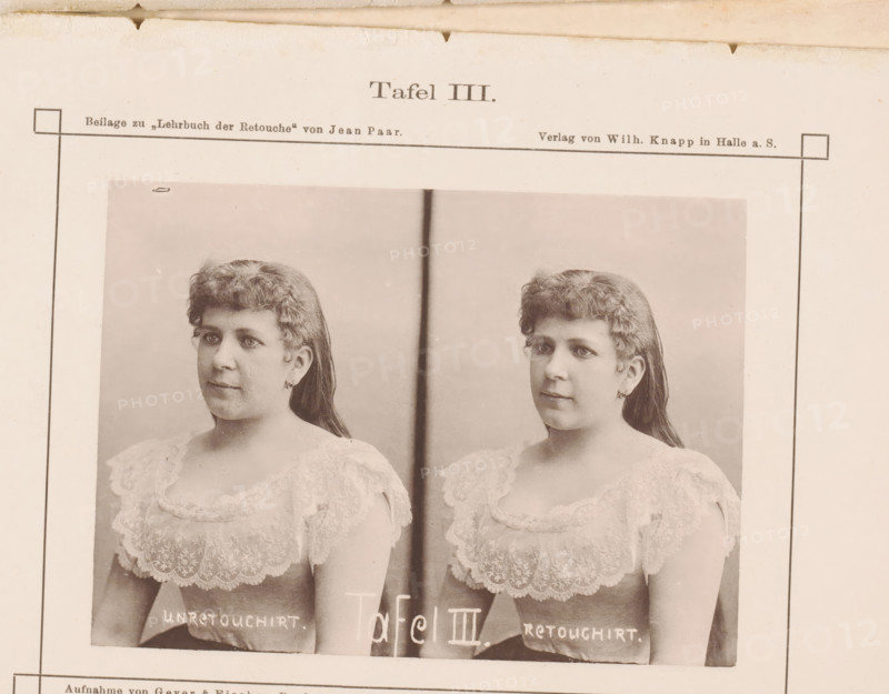 Two portraits of an unknown woman, with and without retouching, page, photomechanical print, inscription: 'unretouchirt retouchirt', number: 'Tafel III.', photographer: Geyer & Fischer, Breslau, clichémaker: anonymous, c. 1880 - in or before 1890, Prussia, Bohemia, paper, collotype, photogravure, height 91 mm x width 126 mm, adult woman, A sepia-toned photograph printed on paper showing two near-identical portraits of a woman placed side by side, each portrait framed by thin black lines and set against a pale background; the woman has wavy, shoulder-length hair pulled back, visible earrings, and a lace-trimmed dress with a scalloped neckline and detailed lace patterning, and the paper shows slight discoloration and small stains near the top edge.