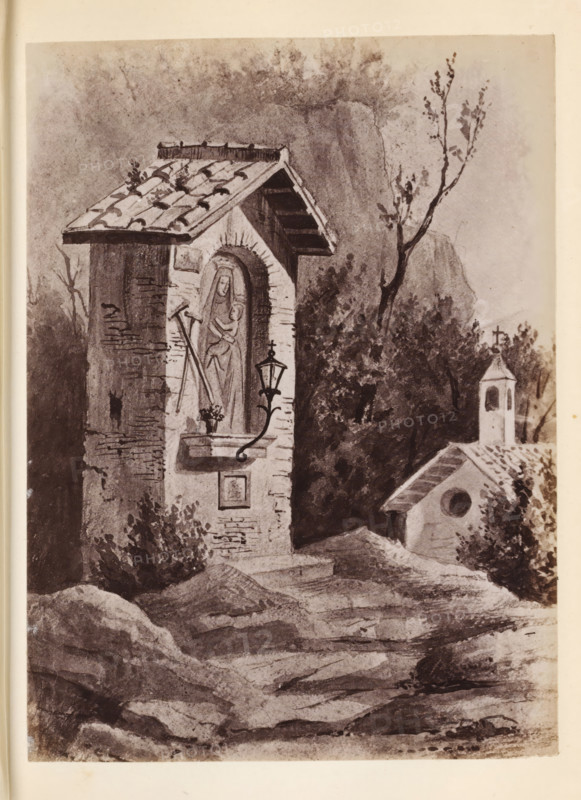 Photo reproduction of a drawing of an outdoor altar, presumably in Italy, photograph, reproduction, page, after drawing by anonymous, c. 1850 - in or before 1860, photographer, paper, albumen print, height 129 mm x width 95 mm, altar, A grayscale drawing of a small stone shrine with a tiled pitched roof and an arched niche containing a carved figure draped in robes, positioned on a rough stone wall with visible bricks and a small ledge holding a flowerpot; an ornate lantern hangs from a curved bracket on the shrine wall, and a narrow path or rocky foreground leads past vegetation and shrubs toward a smaller building with a circular window and a bell tower topped by a cross, while slender trees rise behind the structures against a textured sky.