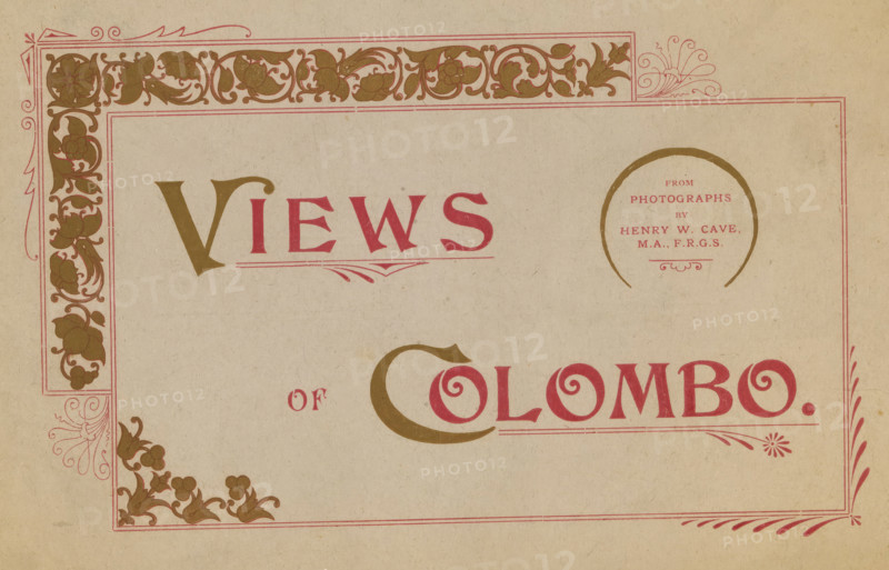 Views of Colombo, book, inscription: 'nov 1988', photographer: Henry William Cave, 1890 - 1910, pasteboard, paper, collotype, printing, height 154 mm x width 230 mm x thickness 3 mm, A section of textured beige paper with a decorative rectangular border in muted pink and olive green; the border includes floral and leaf scrollwork in olive green at the top and left edges and ornamental corner flourishes in pink. Large stylized letterforms in olive green and pink occupy the center and lower right area, with a circular olive green ring containing small lines of pink text near the top right. Additional pink ornamental lines and a small floral motif appear along the lower right edge. The overall image shows aged paper grain and subtle speckling.
