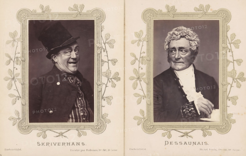 Skriverhans, Portrait of Joachim Ludvig Phister as a writer from Eventyr paa fodreisen, photograph, page, inscription: 'Eneberettiget Eventyr paa fodreisen, 1st Act, 3rd Scene.', photographer: Harald Paetz, c. 1862 - c. 1872, paper, albumen print, albumendruk, height 91 mm x width 58 mm, Person, Joachim Ludvig Phister, portrait of actor, actress, stage costume, A sepia-toned image shows two framed portrait photographs side by side on a patterned background with botanical border illustrations. The left portrait features a man wearing a tall hat and a dark coat with visible buttons, a patterned shirt beneath, and a smiling expression with visible teeth and crinkled eyes. The right portrait shows an older man with curly hair and sideburns, wearing a dark coat and a light-colored cravat or neckcloth, with one hand partially visible near his chest and a contemplative facial expression. Both portraits are set within ornate rectangular frames decorated with leaves and floral motifs.