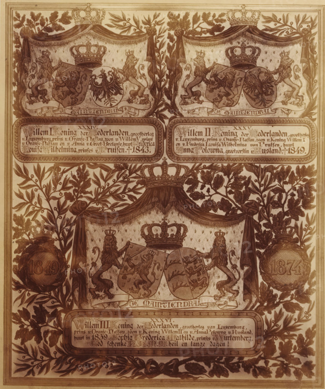 Photo reproduction of a drawing of a family tree, from King William I to King William III, album page, photograph, reproduction, This photo is part of an album., after drawing by Gerard Slits, Rolduc, 1874, photographer, Kerkrade, pasteboard, paper, albumen print, height 184 mm x width 155 mm, Person, William I of the Netherlands, William II of the Netherlands, William III (King of the Netherlands), family lineage, pedigree, genealogical tree or table, series of rulers, A sepia-toned ornamental print showing a central shield held by two rampant lions beneath a large crowned canopy, flanked by leafy branches and decorative urns, with smaller crowned shields and banners above, ornate framed panels below and floral foliage bordering the composition.