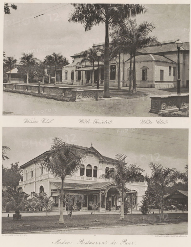 Witte Sociëteit (above) and restaurant De Boer (below) in Medan, Witte Sociëteit (above), Medan. Restaurant de Boer (below), photomechanical print, Part of Album with heliogravures of Sumatra's east coast., number: '10', photographer: Carl J. Kleingrothe, Medan, cliché maker: Johann Baptist Obernetter, Munich, in or before 1898, Carl J. Kleingrothe, Johann Baptist Obernetter, photographer, cliché maker, Bavaria, Sumatra, paper, photoaquatint, heliogravure, height 132 mm x width 218 mm, height 125 mm x width 219 mm, club, meeting place, restaurant, A sepia-toned image showing two large colonial-style buildings separated by a horizontal band, each building framed by tall palm trees and planted landscaping. The upper building is a single-story structure with a covered entrance supported by columns, shuttered windows, decorative low stone balustrades along the frontage, and street lamps with round globes beside a paved walkway. The lower building is a two-story villa with an ornate wraparo...