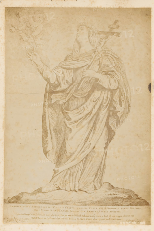Photo reproduction of an engraving by Liduina van Schiedam with crucifix and rose branch by Cornelis Visscher, photograph, reproduction, page, after print by Cornelis Visscher (II), after design by Pieter Claesz. Soutman, c. 1856 - in or before 1877, Cornelis Visscher (II), photographer, after print by, paper, albumen print, height 244 mm x width 166 mm, Photo on page 72., Person, Liduina van Schiedam, the virgin Lidwyna (Lydwine) of Schiedam, possible attributes: crucifix, branch of roses in hand, roses in hair, A monochrome engraved image of a robed woman standing on a textured ground, wearing flowing drapery with detailed folds and a head wreath; she holds a long staff topped with a cross in one hand and extends her other hand upward toward a small winged cherub partly visible near the top corner, the cherub appearing among floral branches; the woman gazes upward and the background is plain with subtle age spotting and a narrow framed border around the image.