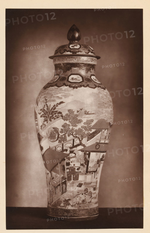 Chinese painted vase, from the collection of Christopher Beckett Denison, page, photomechanical print, number: '1480', after design by anonymous, c. 1880 - in or before 1885, paper, Woodburytype, height 193 mm x width 121 mm, Print on third unnumbered page after page 150., container of ceramics: jar, jug, pot, vase, A tall lidded vase photographed against a plain backdrop, with a bulbous rounded top tapering down to a narrower base, the lid topped by a pointed finial. The surface of the vase is covered in detailed painted scenes and decorative borders, showing stylized clouds, tree branches with foliage, architectural elements like roofs and open-sided pavilions, and numerous small human figures engaged in various activities. Bands of ornate patterning encircle the neck and lower rim, and there are framed cartouches with small pictorial motifs near the shoulder. The image is in a monochrome sepia tone with even lighting and a narrow neutral border around the photograph.