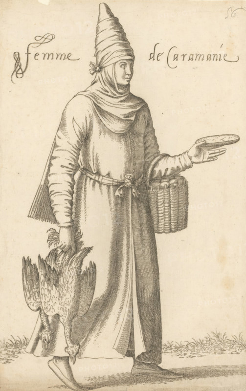 Femme de Caramanie, Woman with Poultry and a Basket of Eggs from Karaman, print, album cover, book illustration, Print is part of an album., printmaker: Léon Davent, after drawing by Luca Penni (attributed to), after drawing by Nicolas de Nicolay (possibly), publisher: Guillaume Rouille (I), Lyon, 1555 - 1568, Attributed to, paper, etching, pasted on album page, height 274 mm x width 172 mm, A standing figure in long layered garments and a tall wrapped headdress, facing right, with a draped hood around the neck and shoulders and a tied belt at the waist; one gloved hand extended holding a shallow round object and the other hand grasping the legs of a large bird carried upside down, a woven basket hanging at the figure’s side; detailed linework shows folds and texture of the clothing, patterned sleeves, footwear, and grassy ground beneath the figure.