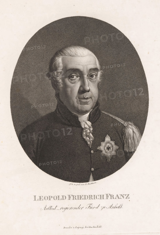 Portrait of Leopold III Friedrich Franz von Anhalt-Dessau, print, printmaker: Ludwig Buchhorn, Dessau, publisher: Gustav Zehl, Dresden, Leipzig, 1802, Saxony-Anhalt, Saxony, paper, stippelwerk, height 280 mm x width 217 mm, Person, Leopold III Frederik Frans van Anhalt-Dessau, historical persons, (military) uniforms, knighthood order (with NAME) - insignia of a knighthood order, eg: badge, chain (with NAME of order), A monochrome oval portrait of an older man shown from the chest up against a dark textured oval background, with a pale surrounding border; he has neatly combed light hair with curls at the sides and a smooth forehead, arched eyebrows, wide eyes looking slightly to one side, a prominent nose, and a closed mouth with a subtle expression; he wears a dark formal coat with a high collar, a ruffled neckcloth at the throat, a decorative star-shaped badge on the chest, and a shoulder epaulette with hanging tassels.