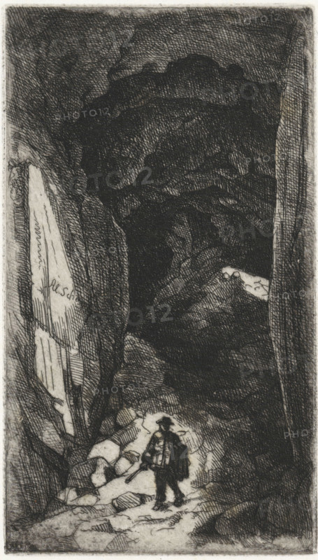 Cave entrance with walking man, Quarry in the Sint Pietersberg, Près de la Meuse, 11 Eaux-Fortes, print, printmaker: Alexander Schaepkens, c. 1859, paper, chine collé, etching, height 163 mm x width 192 mm, Etching from the series Montagne Saint Pierre, XI plates by Alex. Schaepkens (1859)., cave, grotto, Sint-Pietersberg, A narrow vertical black-and-white etching showing a rocky, shadowed canyon interior with heavy crosshatched shading; a small figure stands near the bottom wearing a wide-brimmed hat and a cloak, holding a walking stick and facing inward, surrounded by uneven ground and scattered boulders; tall, jagged rock walls rise on either side, their surfaces rendered with dense lines and varied textures, and a lighter patch of rock is visible partway up one side while darker, cloudlike shading fills the upper area of the composition.