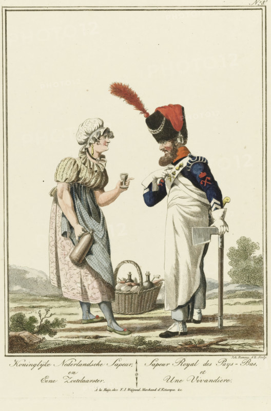 Royal Dutch Sapeur and a sweetseller, Sappeur with a sweetseller, Uniforms and traditional costumes, print, Series number, 8, 12, printmaker: Joannes Bemme, Rotterdam, after drawing by Jan Anthonie Langendijk Dzn, publisher: François Joseph Weygand, 1800 - 1841, paper, etching, hand coloring, hand colored, height 280 mm x width 203 mm, folk costume, regional costume, street-trader - BB - women engaged in trade and commerce, (military) uniforms, female sutler, canteen-woman, A colored print shows a woman and a man standing and facing each other on a simple outdoor ground with distant low hills and a tree. The woman wears a patterned bonnet, a short puffed-sleeve dress with a ruffled collar, an apron, patterned skirt, and stockings with shoes that have small decorative pom-poms; she holds a bottle in one hand and a small cup in the other, and a wicker basket filled with bottles and loaves sits at her feet. The man wears a tall fur hat topped with a long feather and a red cloth, a dark ja...
