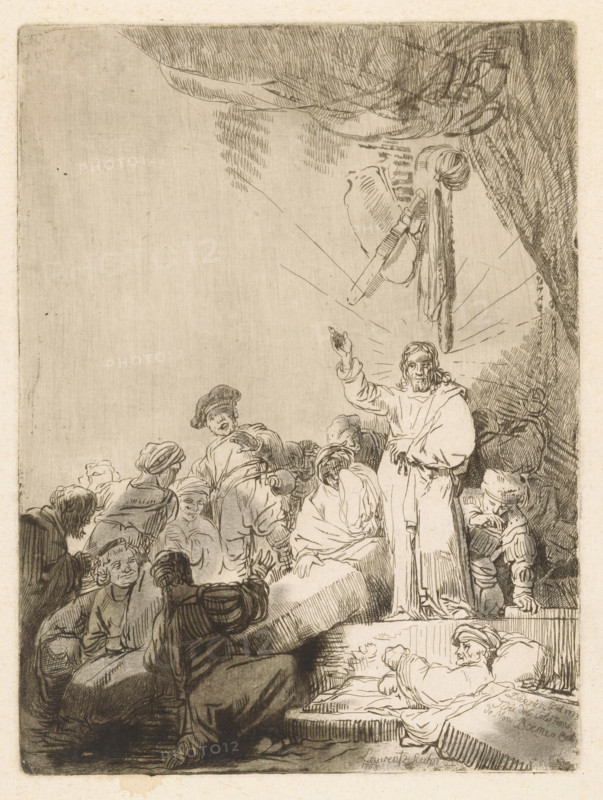Raising of Lazarus, print, printmaker: Johann Daniel Laurentz, Germany (possibly), after drawing by Christian Wilhelm Ernst Dietrich, 1763, paint (coating), paper, watercolor (paint), etching, intaglio printmaking technique, brush, background in plate tone, figures with brush in shades of gray, height 266 mm x width 199 mm, curtains, the raising of Lazarus ('Lazarus, come out'), weeping, A detailed etching shows a central robed figure standing with one arm raised and a halo of radiating lines around the head, surrounded by a crowd of seated and standing people in varied garments and headwear, many turning toward the central figure with expressive faces and gestures; above them a suspended bundle of objects and draped fabric hangs from an upper edge, and in a lower corner a reclining figure rests on a mattress or bench while others crowd nearby, all rendered in fine hatched lines and sepia tones against a blank upper background.