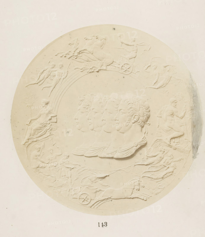 Commemorative medal in memory of the Battle of Waterloo with four busts of King George III of England, Emperor Francis II of Austria, Tsar Alexander I of Russia and King Frederick William III of Prussia, photograph, page, number: '143', photographer: F. Cole, c. 1857 - in or before 1867, paper, albumen print, height 125 mm x width 125 mm, memorial medal, A circular relief with a pale, uniform surface showing embossed classical figures and scenes arranged around the rim and center, including a seated draped woman holding an object, a bearded kneeling male figure, winged figures in flight, and a charioteer driving a chariot pulled by horses; a row of repeated male profiles with laurel-wreathed hair appears across the middle, and decorative curved lines and flowing drapery link the figures throughout the composition.