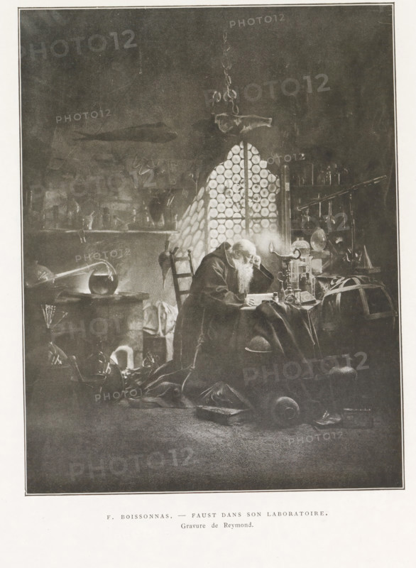 Faust in his laboratory, Faust dans son laboratoire, page, photomechanical print, photographer: Frédéric Boissonnas, cliché maker: Reymond, 1896, paper, autotypie, height 187 mm x width 145mm, Faust, A dimly lit interior scene shows an older man with a long beard seated at a cluttered wooden table, leaning on one hand while writing or reading under the light of an oil lamp; he wears a heavy robe and sits on a simple chair with a high back. Behind him a tall window with many small circular panes casts a patterned light; nearby shelves and racks hold glassware and various scientific-looking apparatus including flasks and tubes. The room contains many scattered objects such as folded cloths, boxes, spherical vessels, and a large domed or strapped container, and a rounded glass vessel sits on a table with a curved pipe leading from it. Overhead a chain or hanging fixture and a suspended object are visible against a dark textured wall, and soft shadows and highlights emphasize the worn surf...