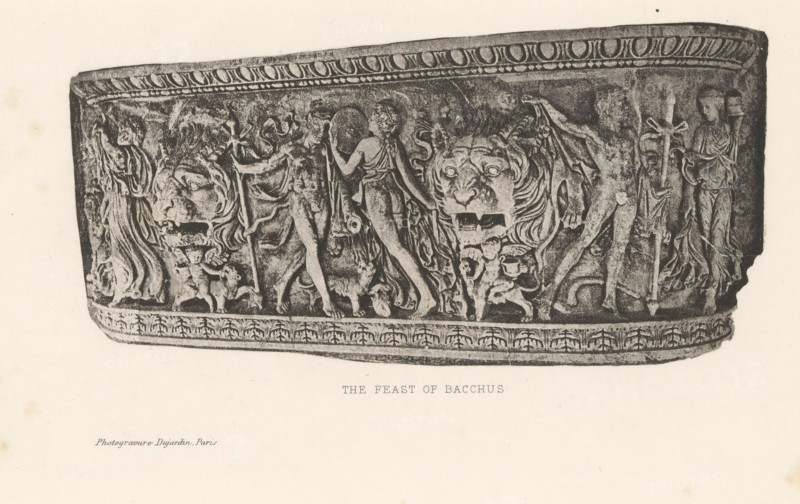 Relief of a sarcophagus, depicting a bacchanal, The feast of Bacchus, page, photomechanical print, cliché maker: Dujardin Frères, Paris, c. 1867 - in or before 1877, photographer, paper, photoaquatint, height 145 mm x width 224 mm, sarcophagus, thiasos, ie Bacchus' revel-rout, bacchanal without Bacchus, decorating 'en relief', appliquéing, A horizontal stone relief with a decorative border along the top and bottom shows a procession of carved human figures and mythic elements in high relief; several draped and partially nude figures face different directions, some holding staffs or curved objects, and one figure appears to be reaching toward another. Two large carved feline heads with open mouths are prominent in the center area, integrated into flowing drapery and vegetal motifs. Smaller childlike figures and animal forms appear near the base, and elaborate folds of cloth and braided hair detail the humans. The overall surface shows textured carving and worn stone tones against a ligh...