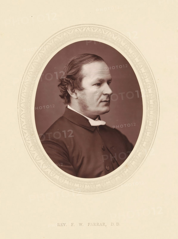 Rev. FW Farrar, DD, page, photomechanical print, photographer: Lock & Whitfield, cliché maker: anonymous, c. 1871 - in or before 1876, paper, Woodburytype, height 115 mm x width 89 mm, Person, Frederic Farrar, writer, poet, author, historical persons (portraits and scenes from the life) ((full) bust portrait), A sepia-toned oval portrait framed by a decorative border shows a man in three-quarter profile facing right, with wavy hair brushed back from his forehead and sideburns along his cheeks, wearing a dark buttoned coat and a light-colored collar, set against a plain darker background.