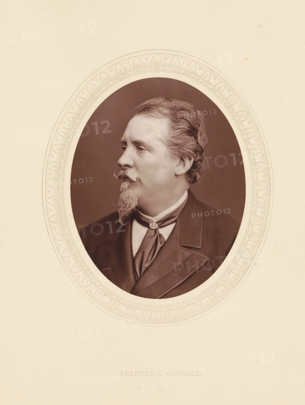 Frederick Goodall, page, photomechanical print, photographer: Lock & Whitfield, cliché maker: anonymous, c. 1873 - in or before 1878, paper, Woodburytype, Woodbury Process, height 115 mm x width 89 mm, Person, portrait, self-portrait of painter, historical persons (portraits and scenes from the life) ((full) bust portrait), An oval sepia portrait of a middle-aged man shown in profile facing left, mounted on a pale background with a decorative oval border; the man has wavy hair swept back, a curled mustache and a pointed goatee, and he wears a dark coat with wide lapels, a light shirt, and a neck scarf fastened with a small ornamental pin.