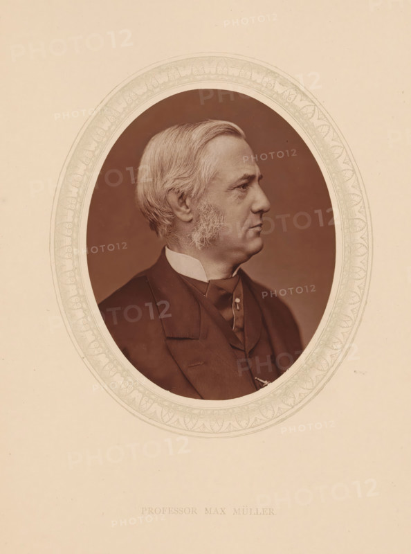 Professor Max Müller, page, photomechanical print, photographer: Lock & Whitfield, cliché maker: anonymous, c. 1873 - in or before 1878, paper, Woodburytype, Woodbury Process, height 115 mm x width 89 mm, Person, Max Müller, scholar, philosopher, historical persons (portraits and scenes from the life) ((full) bust portrait), A sepia-toned oval portrait of an older man shown in profile facing right, with light-colored hair combed back and sideburns, wearing a dark suit jacket, vest, high-collared shirt, and a cravat or tie fastened with a small decorative pin, set against a plain darker background and framed by an ornate patterned oval border on a lighter paper background.