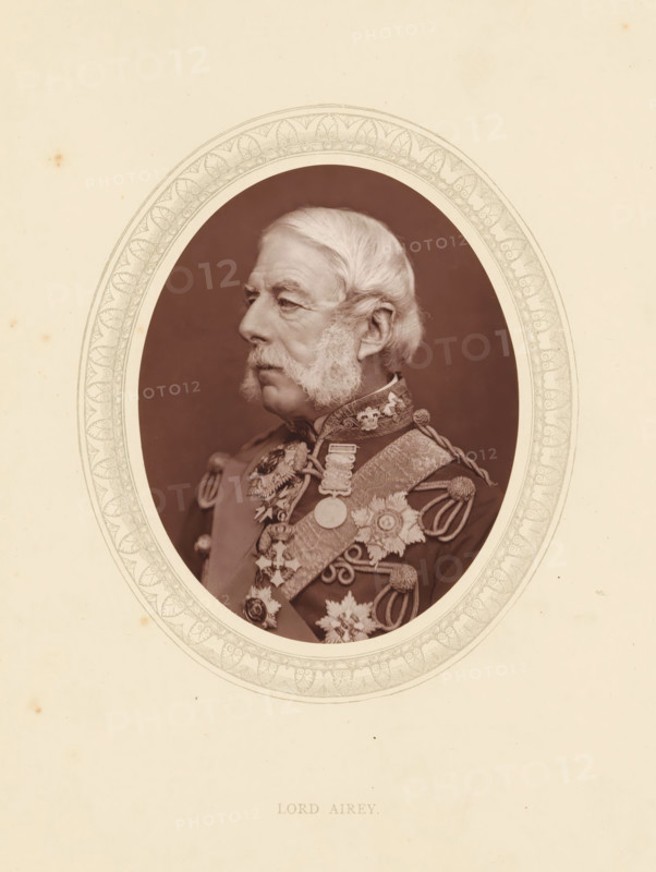 Lord Airey, page, photomechanical print, photographer: Lock & Whitfield, cliché maker: anonymous, c. 1873 - in or before 1878, paper, Woodburytype, Woodbury Process, height 115 mm x width 89 mm, Person, Richard Airey (1st Baron Airey), officer, historical persons (portraits and scenes from the life) ((full) bust portrait), A sepia-toned oval portrait of an older man in formal military attire is centered on a pale sheet with a decorative oval border; he is shown in profile facing left with white hair and prominent sideburns, wearing a richly embroidered uniform adorned with braided cords, medals, star-shaped insignia, and ornate collars, all captured against a dark background within the oval.