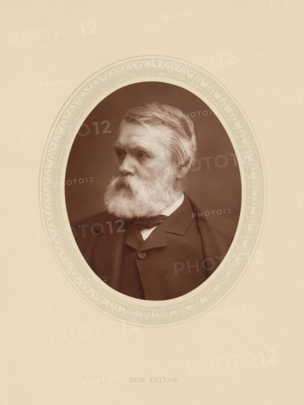 Tom Taylor, page, photomechanical print, photographer: Lock & Whitfield, cliché maker: anonymous, c. 1876 - in or before 1881, paper, Woodburytype, Woodbury Process, height 115 mm x width 89 mm, Person, criticzing and discussing art, art critical, historical persons (portraits and scenes from the life) ((full) bust portrait), An oval-framed sepia portrait of an older man shown from the chest up, with neatly combed light hair and a full white beard, wearing a dark suit jacket, waistcoat, and a bow tie, set against a plain dark background and surrounded by a decorative light-colored mat.