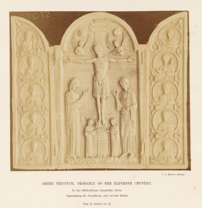 Greek triptych, probably of the eleventh Century, Ivory Greek triptych, depicting the crucifixion of Christ and saints, photograph, page, number: '(Class VII.) f.', inscription: 'In the Bibliothèque Impériale, Paris, Representing the Crucifixion, and various Saints. Size 11 inches by 9.5.', photographer: JA Spencer, c. 1850 - in or before 1856, paper, albumen print, height 126 mm x width 142 mm, piece of sculpture, reproduction of a piece of sculpture, Christ dead, particularities of crucifixion scenes, A carved triptych panel with a central arched section depicting a crucified figure with outstretched arms flanked by two standing figures and two smaller kneeling figures below, the central scene framed by tall rectangular borders and topped by two small winged figures near the arch, and two hinged side panels each containing vertical rows of circular medallion portraits of bearded figures in draped garments, all rendered in a pale stone tone against a darker rectangular background.