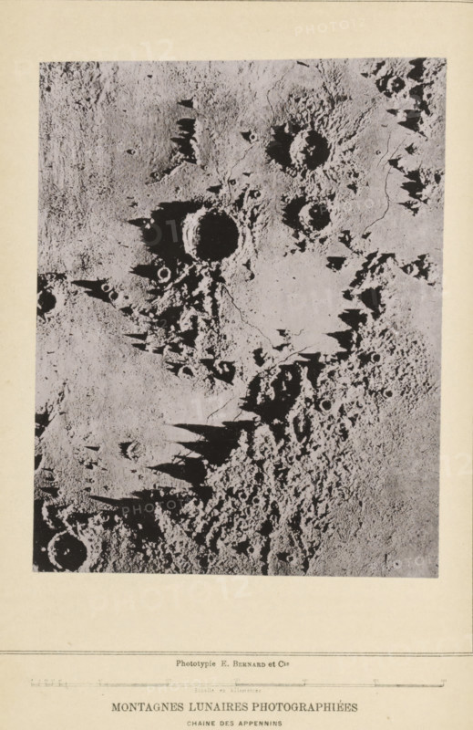 Montagnes lunaires photographiées, Plaster model, representing the surface of the Moon, page, photomechanical print, inscription: 'Chaine des appenins', number: 'PL. III', photographer: James Nasmyth, cliché maker: Bernard & Cie, c. 1874 - in or before 1884, paper, collotype, photoprint, height 155 mm x width 122 mm, surface of the moon, Moon, A rectangular grayscale photograph with irregular dark circular depressions and raised jagged shadows on a textured pale surface, showing rough cratered terrain with sharp angular protrusions and uneven granular areas, surrounded by a wide pale border.