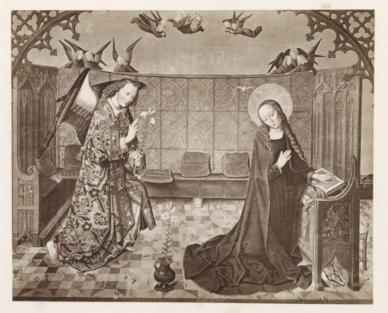Photo reproduction of a print after a painting, depicting the Annunciation, photograph, reproduction, page, after print by anonymous, after painting by Master of the Lyversberg Passion, c. 1859 - in or before 1869, photographer, after print by, paper, albumen print, height 129 mm x width 161 mm, the Annunciation: Mary kneeling, A detailed monochrome scene shows an angel with patterned robes and large wings approaching a seated woman with a halo, who wears a dark flowing cloak and rests one hand on an open book while the other touches her chest. The setting includes a checkered floor with scattered small flowers, a tall vase holding a slender flowering stem between the figures, cushioned benches behind them, an ornately carved wooden lectern supporting the book, and decorative Gothic-style architectural panels framing the space. Several small winged figures hover above the central partition, and a small bird appears near the haloed woman's head. The angel holds a long flowering stalk an...