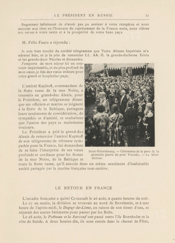 President Félix Faure and Tsar Nicholas II of Russia at the ceremony of laying the foundation stone of the Troitsky Bridge in Saint Petersburg, page, photomechanical print, inscription: 'Saint-Pétersbourg.-, La bénédiction.', 1897, paper, collotype, light print, height 75 mm x width 63 mm, Person, Nicholas II Alexandrovich (Tsar of Russia), Félix Faure, ruler, sovereign, official acts of rulers, eg royal acts (ruler giving audience, granting mercy, etc., ruler and his subjects), bridge, ceremonial laying of the foundations, laying the first stone, A yellowed page from a book or magazine with printed columns of text and a centered heading near the top, a rectangular black-and-white photograph inset on the right side of the page showing a crowded outdoor scene with many formally dressed men and a few women, some wearing ornate robes and uniforms, and a tent or canopy with patterned fringe visible above the crowd.