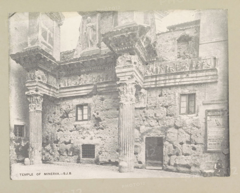 Temple of Minerva, page, photomechanical print, photographer: Samuel J. Beckett, Rome, c. 1890 - c. 1900, paper, collotype, photoprint, height 151 mm x width 198 mm, temple, shrine, Roman religion, facade (of house or building), Temple of Minerva Medica (Rome), A grayscale photograph of an ancient stone facade featuring fluted columns with ornate capitals supporting a carved entablature, a frieze with sculpted figures, and a projecting cornice; the stone wall shows rough, weathered blocks with small rectangular windows and a doorway, and a portion of a poster or notice is visible affixed to the wall; the ground in front of the facade is paved and a person is seated near the lower right corner.
