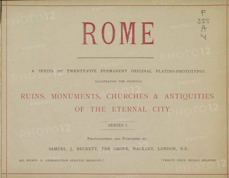 Rome, book, photographer: Samuel J. Beckett, London, c. 1900, textile materials, pasteboard, paper, linen (material), printing, collotype, color on cut, height 219 mm x width 279 mm x thickness 21 mm, The image shows the top portion of an aged book or printed page with a pale beige background and thin red border lines near the edges; a large bold word appears centered near the top in red type, with a thin horizontal rule beneath it and several lines of smaller printed text below in dark ink; there are decorative red capitalized words across the middle of the page and additional smaller text and a pair of thin horizontal rules further down; pencil markings appear in the upper right margin and there are small spots and signs of age on the paper.