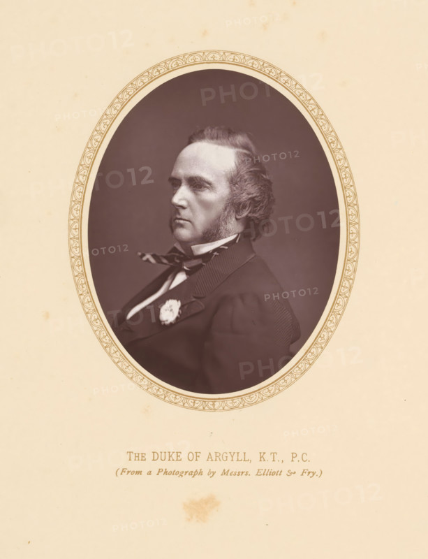 The Duke of Argyll, KT, PC, page, photomechanical print, photographer: Elliott & Fry, London, c. 1875 - c. 1880, printmaker, paper, Woodburytype, height 112 mm x width 86 mm, Person, George Campbell, politician, eg party leader, An oval sepia-toned portrait of a man shown in profile facing left, with a high forehead and sideburns, wearing a dark formal coat with a striped bow tie and a light-colored collar, a decorative flower pinned to his lapel, set against a plain dark background and framed by an ornate narrow border on a light beige mount.