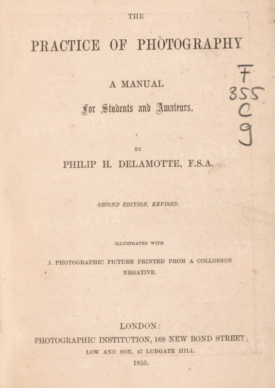 The practice of photography, book, name: 'Robt Archer Jary 1st 1886', writer (clerical worker): Philip Henry Delamotte, publisher: Photographic Institution, London, publisher: Low and Son, 1855, writer (clerical worker), textile materials, paper, linen (material), printing, albumen print, height 183 mm x width 120 mm x thickness 15 mm, A faded, aged title page on cream-colored paper with printed lines of serif text arranged in centered blocks, showing ornamental and plain typefaces, decorative small ink spots and smudges scattered across the surface, a vertical column of dark handwritten marks along the right margin, and uneven discoloration and faint creases near the edges.