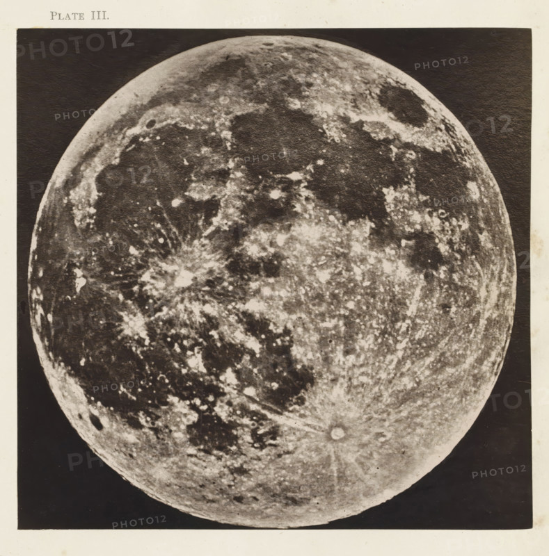 Full Moon, page, photomechanical print, number: 'Plate III.', photographer: Warren de la Rue, Europe, cliché maker: Séraphin-Médéric Mieusement, United Kingdom, c. 1870 - in or before 1873, paper, Woodburytype, Woodburytypepie, height 153 mm x width 157 mm, Print for page 53., Moon, A large circular object fills the center of the image, showing a textured surface with many irregular light and dark patches, circular depressions, and streaked patterns; the object's upper edge curves into a dark background and its lower edge tapers into the same dark area, with a narrow light border framing the whole scene.