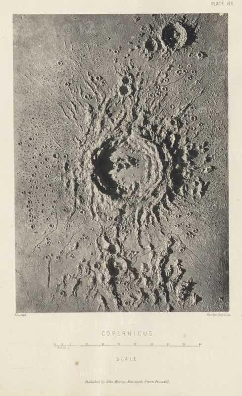 Copernicus, page, photomechanical print, name: 'Published by John Murray, Albemarle Street Piccadilly.', number: 'Plate VIII.', inscription: 'Scale', photographer: James Nasmyth, United Kingdom, cliché maker: anonymous, printer (person): Vincent Brooks, Day & Son, publisher: John Murray, London, c. 1870 - in or before 1873, printer (person), paper, Woodburytype, height 177 mm x width 126 mm, Print for page 97., surface of the moon, Moon, A grayscale aerial-style image of a rough, heavily cratered surface dominated by a large, circular central crater with raised, jagged rims and radial ejecta streaks extending outward; surrounding the main crater are numerous smaller circular depressions and overlapping crater rims of varying sizes, as well as rough, uneven terrain with ridges, grooves, and textured shadows that emphasize depth and rugged relief across the scene.
