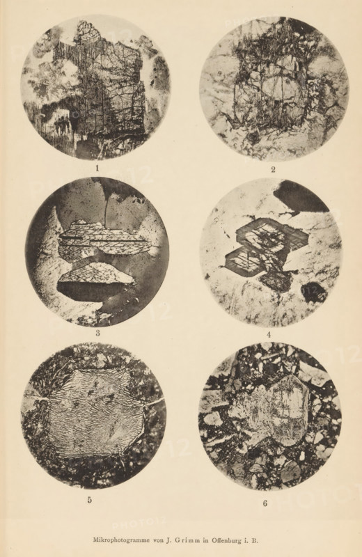 Six microscopic enlargements of minerals, page, photomechanical print, Image 1 is augite, 2 is augite, 3 is amphibolite, 4 is quartz diorite, 5 and 6 is uralite., number: 'Tafel XXI', number: '1, 6', photographer: Emil Cohen, Greifswald, cliché maker: J. Grimm, Offenburg, c. 1880 - in or before 1885, Baden-Württemberg, Mecklenburg-Vorpommern, paper, collotype, photoprint, height 233 mm x width 149 mm, minerals and metals, A vertical sheet showing six circular black and white photographic images arranged in two columns and three rows, each circle containing textured, high-contrast patterns resembling irregular surfaces and layered structures with cracks, veins, and granular areas, the top left circle showing a dark irregular mass with vertical striations and mottled lighter areas, the top right circle displaying a round area with fine branching lines and cloudy lighter patches around it, the middle left circle containing layered plate-like shapes with crosshatched surfaces set against a...