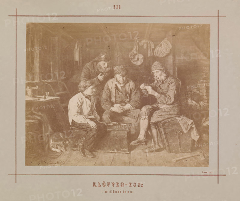 Klöfver-ess i en åländsk kajuta, Photo reproduction of a painting by Karl Emanuel Jansson, depicting men playing cards in a ship's cabin, photograph, reproduction, page, number: 'III', inscription: 'Åland 1871', photographer: Daniel Nyblin, after painting by Karl Emanuel Jansson, c. 1871 - in or before 1880, Daniel Nyblin, Karl Emanuel Jansson, photographer, after painting by, paper, albumen print, albumendruk, height 137 mm x width 175 mm, picture, painting, playing-cards, A sepia-toned image of an interior scene showing four seated men gathered around a small wooden chest that serves as a table, each wearing period clothing and hats; one man holds a pipe near his mouth while another examines a small object in his hands, a younger male sits with hands near the chest and looks toward the center, and a bearded man leans forward from behind the group; the room contains hanging garments and coils of rope on the wall, a wooden floor with visible boards, a trunk or chest used as a seat, a t...