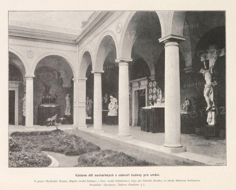 Courtyard of a sculpture gallery in Prague, Výstava del socharských v nádvori budovy pro umení, page, photomechanical print, Prague, cliché maker: Carl Bellmann, c. 1888 - in or before 1893, photographer, paper, autotypie, height 181 mm x width 248 mm, gallery of sculptures, A colonnaded courtyard with a series of rounded arches supported by cylindrical columns, a grassy central area with low plantings, and multiple sculptures displayed beneath the arches including a crucifixion figure mounted on a cross, several standing and seated statues on pedestals, and a group of relief-like plaques arranged on a wall; the image is monochrome and framed by a border.