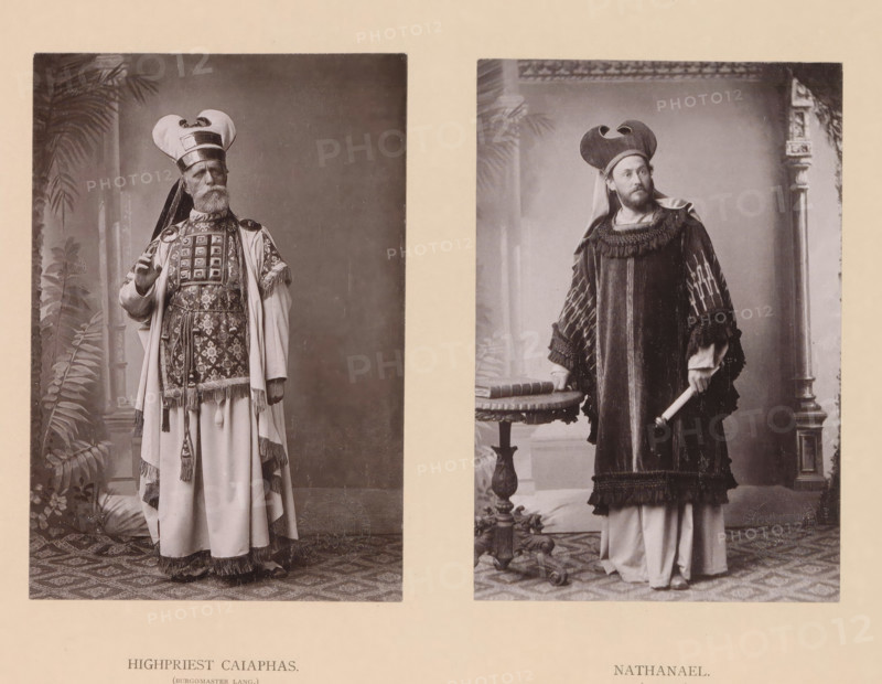 Nathanael, Highpriest Caiaphas, page, photomechanical print, inscription: 'Gemeinde Oberammergau Passionsspiel 1890', photographer: Carl Stockmann, Oberammergau, cliché maker: anonymous, c. 1885 - in or before 1890, Bavaria, paper, collotype, photoprint, height 252 mm x width 335 mm, Prints opposite page 76., Person, Johann Lang, Sebastian Lang, portrait of actor, actress, Caiaphas and the priests conspiring against Christ (Matthew 26:3-5, Mark 14:1-2, Luke 22:2, John 11:47-53), acts of Bartholomew, Two sepia-toned portrait photographs positioned side by side show men in elaborate period costumes standing against studio backdrops. The left portrait features an older man with a full beard wearing a tall, rounded headdress with layered bands and a long robe adorned with patterned panels, tassels, and fringed edges; he holds one hand raised and stands near painted foliage. The right portrait shows a younger bearded man wearing a distinctive curved headdress and a heavy robe with textured ...