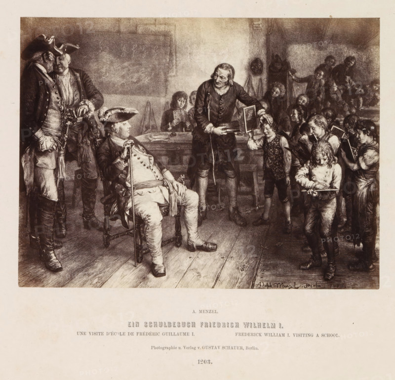 Photographic reproduction of a painting of a school visit by Frederick William I of Prussia by Adolf Menzel, Ein schulbesuch Friedrich Wilhelm I, photograph, reproduction, page, number: '1203.', photographer: Gustav Schauer, Berlin, after painting by Adolph Menzel, c. 1858 - in or before 1868, paper, albumen print, albumendruk, height 135 mm x width 180 mm, Person, Frederick William (Heir apparent of Prussia), elementary school, class, form, A monochrome scene shows a room with wooden floorboards and a group of children and adults grouped around a seated dignified man in ornate clothing and a tricorne hat, who holds a cane and reclines in a carved chair; an older man standing nearby places a hand on a boy's head while holding a book, and the boy stands with a small book in hand; other children stand nearby holding slates and writing implements, some looking down at their tablets and others looking toward the seated man, while two uniformed men in elaborate coats and hats converse to th...