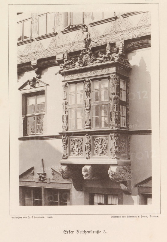 Bay window of a building at Reichenstraße 3 in Braunschweig, Erker Reichenstraße 3, Braunschweig's Baudenkmäler, page, photomechanical print, number: 'No. 17.', photographer: J. Schombardt, Braunschweig, cliché maker: Römmler & Jonas, Dresden, publisher: Benno und Wilhelm Danert Goeritz, 1892, J. Schombardt, Römmler & Jonas, Benno und Wilhelm Danert Goeritz, photographer, cliché maker, publisher, Lower Saxony, Saxony, paper, collotype, photoprint, height 151 mm x width 99 mm, facade (of house or building), bay window, oriel, A close view of a building facade showing an ornate bay window projection with carved decorative panels and sculpted supports, multiple paneled windows within the bay framed by detailed vertical carvings, an ornamented cornice above the bay topped with a small sculpted figure holding a staff, adjacent plain window openings set into the wall, and additional carved architectural details and bracketed elements beneath the bay casting a shadow on the wall.