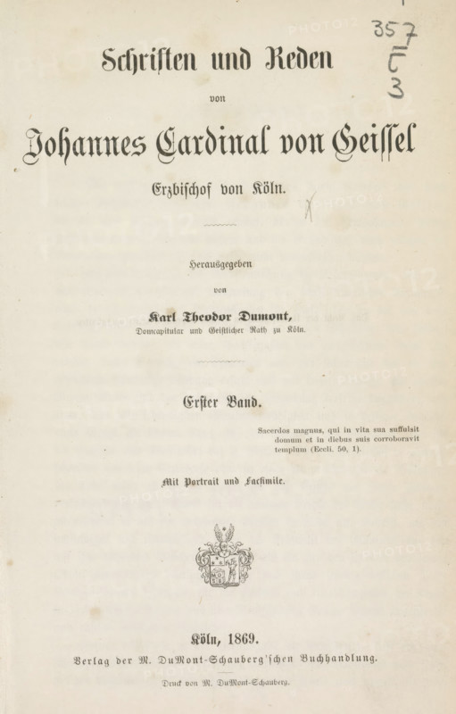 Schriften und Reden von Johannes Cardinal von Geissel Erzbischof von Köln : Erster Band, book, number: '1R118', writer (clerical worker): Johannes von Geissel, publisher: DuMont Schauberg, M., Cologne, 1869, writer (clerical worker), North Rhine-Westphalia, textile materials, pasteboard, biological material, paper, linen (material), leather, albumen print, height 223 mm x width 145 mm x thickness 30 mm, A vertically oriented aged paper page with ornate blackletter headings across the top and center, a faint decorative emblem near the lower middle, and various smaller lines of printed text arranged in centered blocks; the paper shows light stains and age spots, a hand-drawn pencil mark and numerical scribbles near the upper right, and faint horizontal discoloration banding across the page.